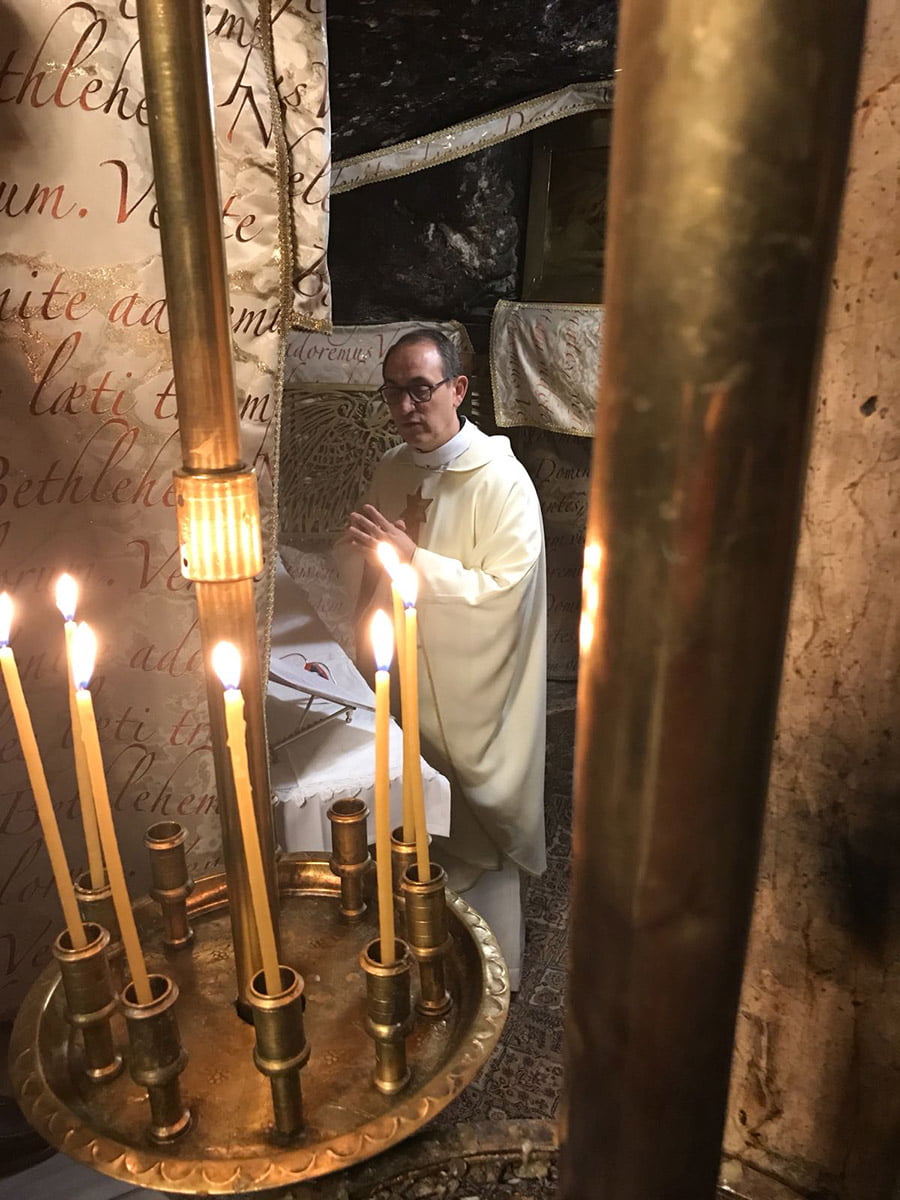 Father Diego celebrates Holy Mass in the cave of the Nativity of Our Lord