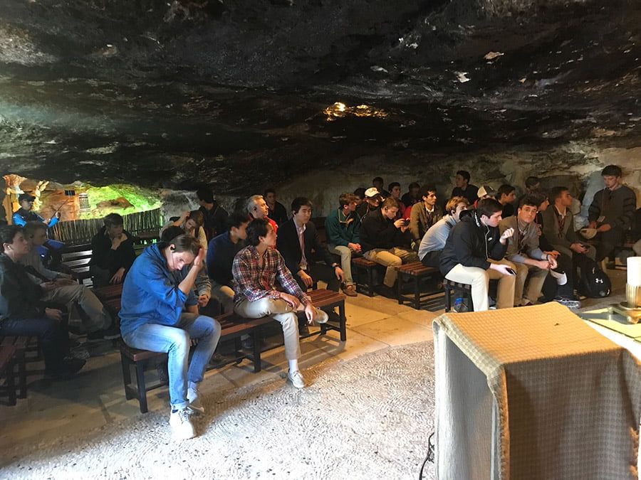 Heights group resting in the cave at Shepherds Field, Bethlehem